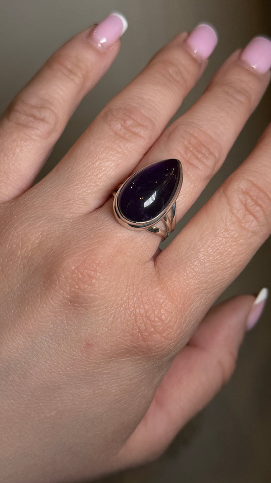 teardrop shape amethyst ring on hand