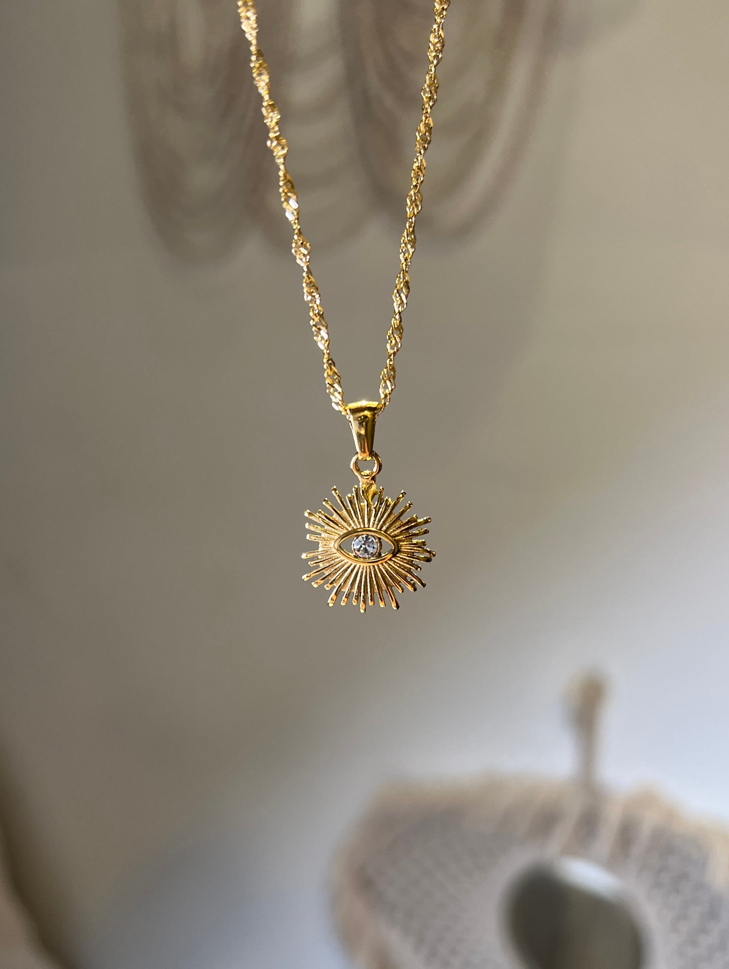 evil eye on a coin necklace