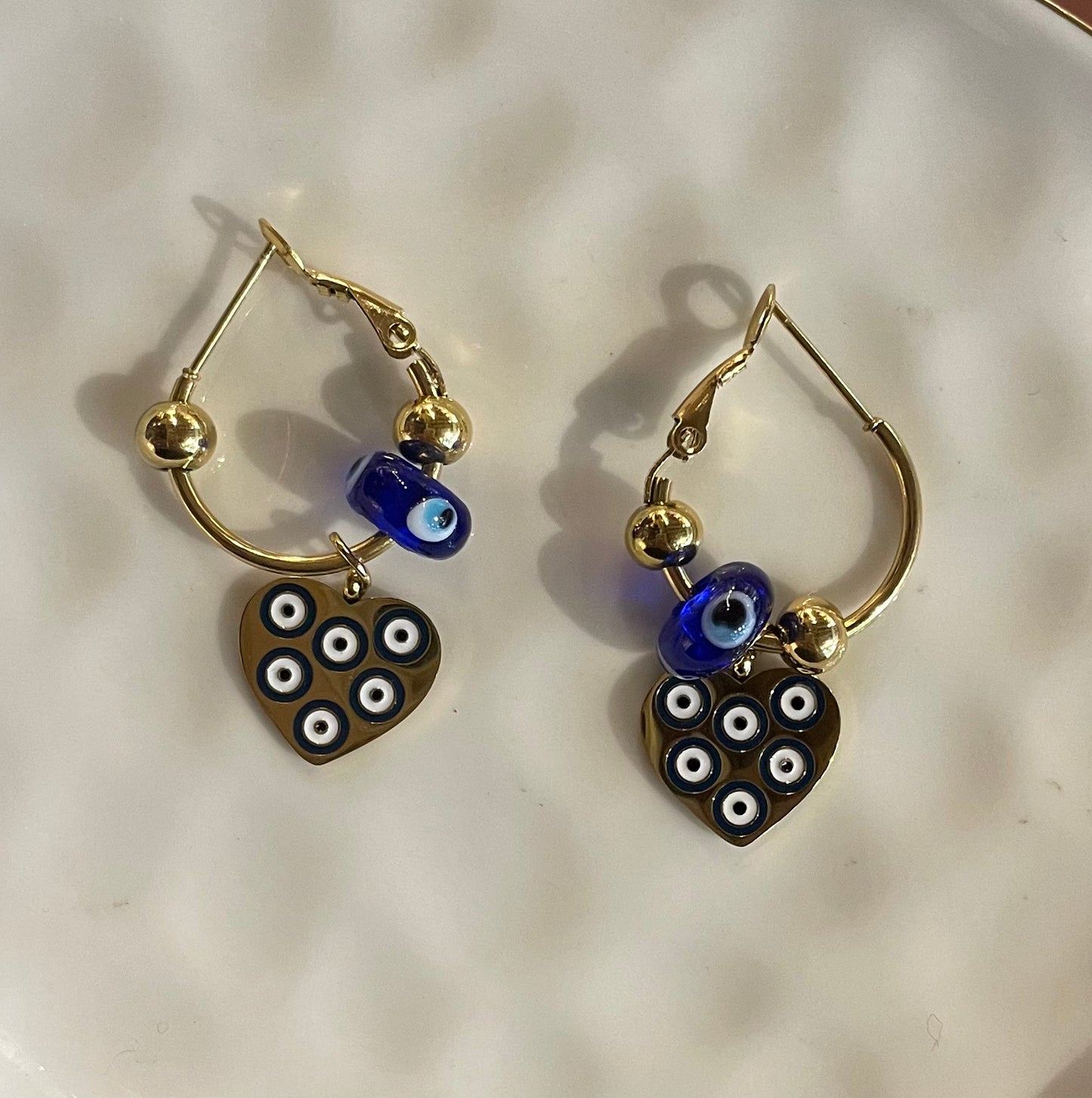 Heart of evil eye earrings