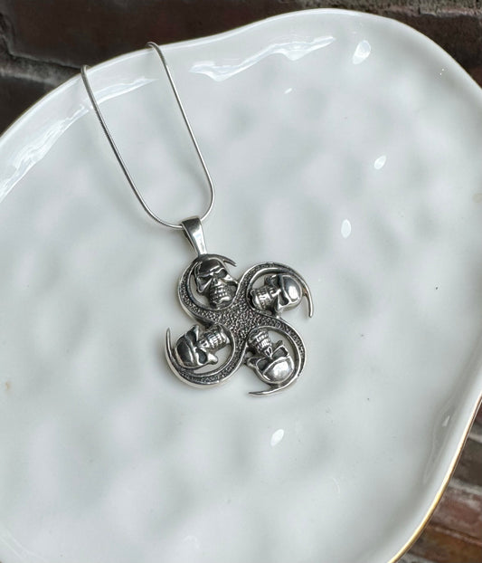 Four Skull Heads Silver Pendant