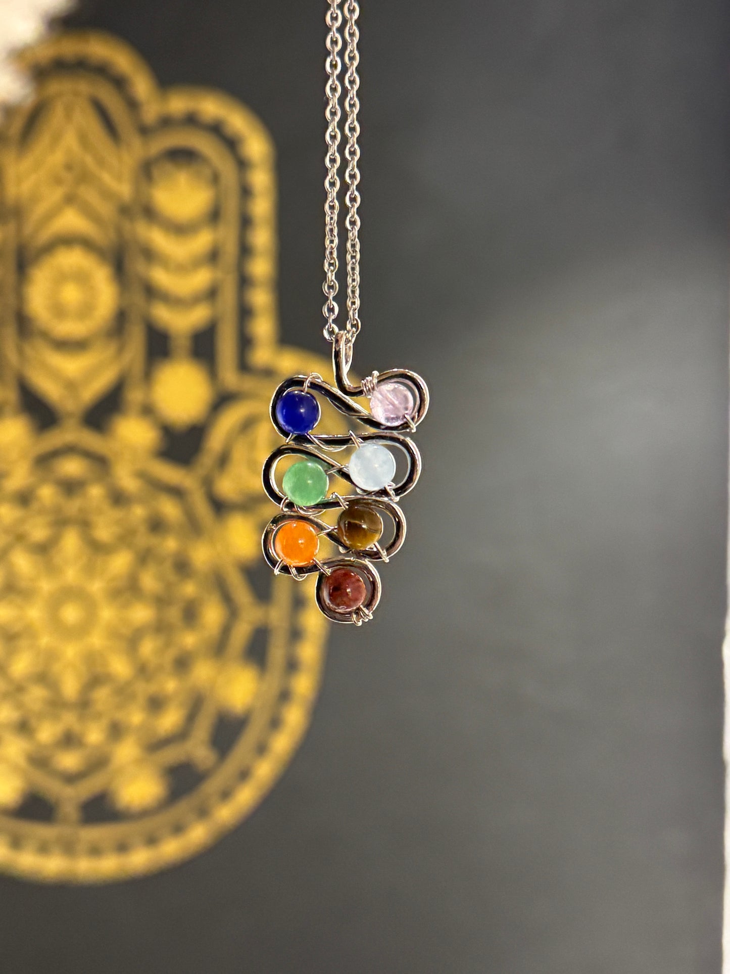 Spiral Chakra pendant with crystals