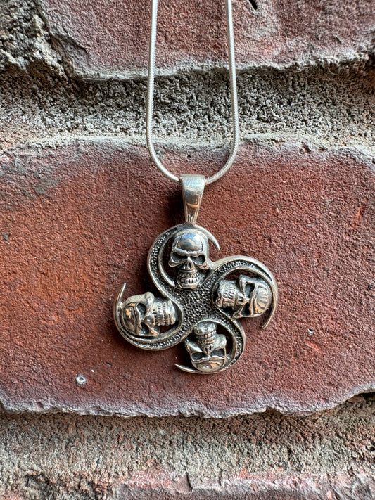 Four Skull Heads Silver Pendant