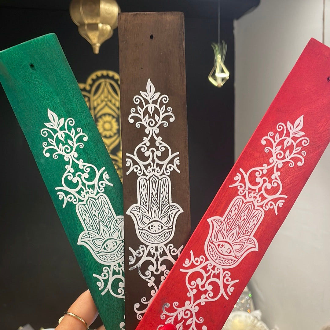 Flat wooden hamsa incense burner