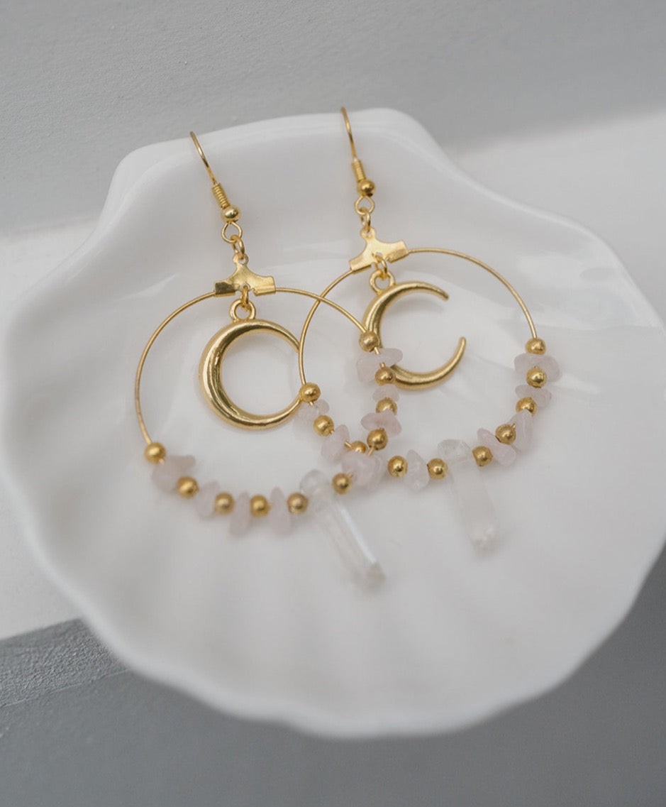 rose quartz earrings with moon symbol