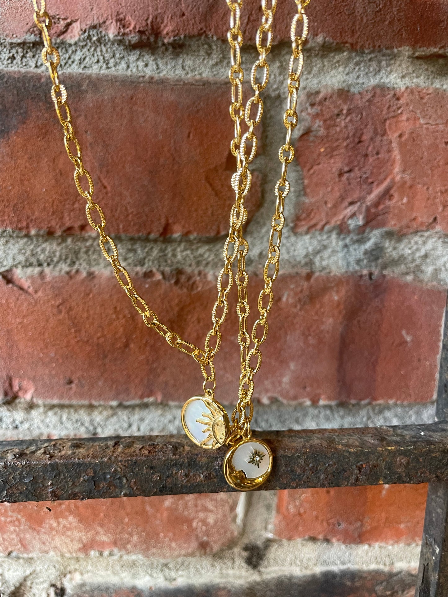 Gold Necklace with Sun and Moon charms
