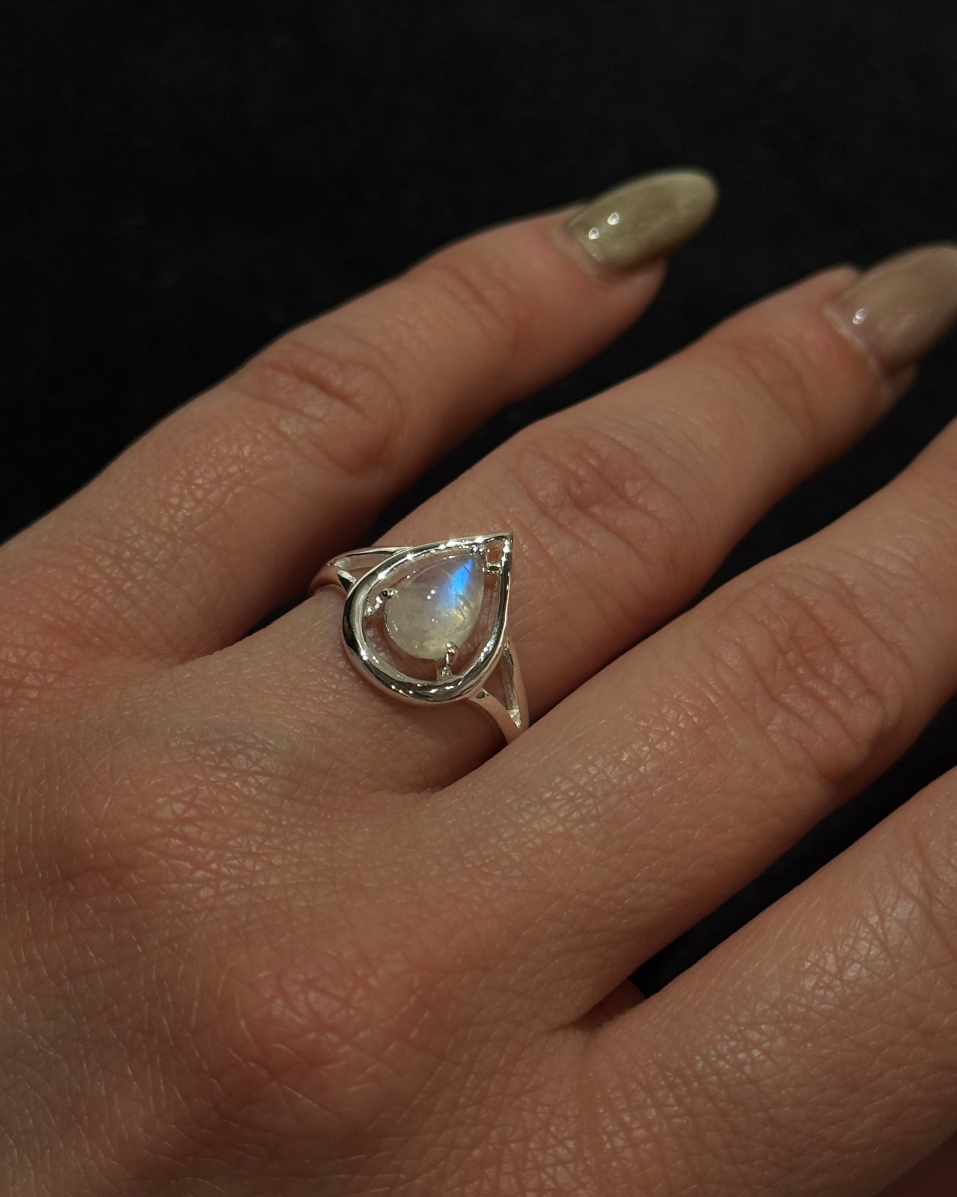 sterling silver dainty feminine ring with natural moonstone teardrop shape