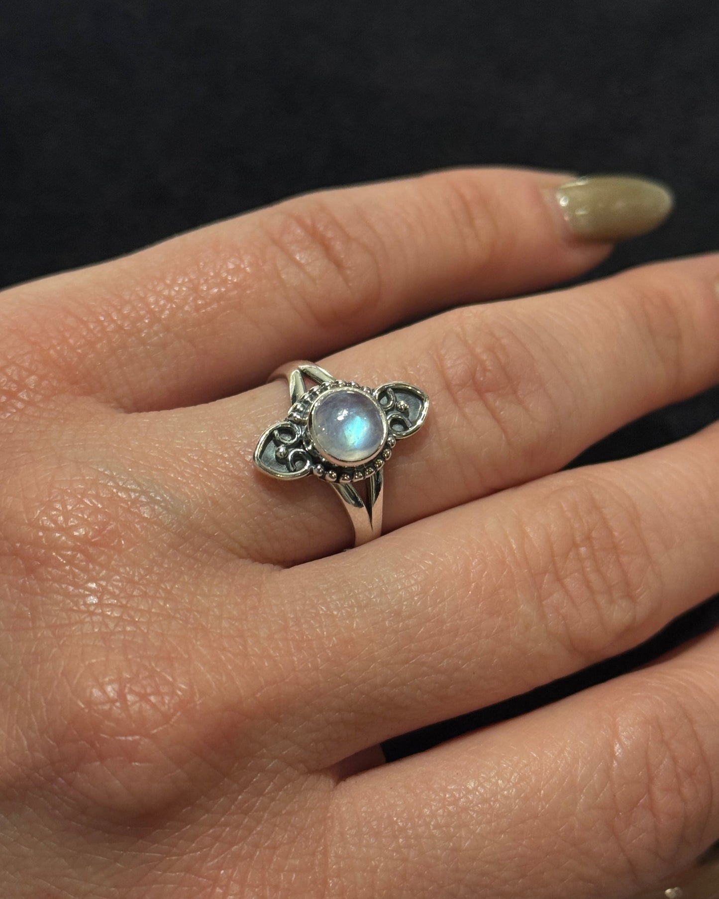 cute feminine sterling silver ring with natural moonstone in the center