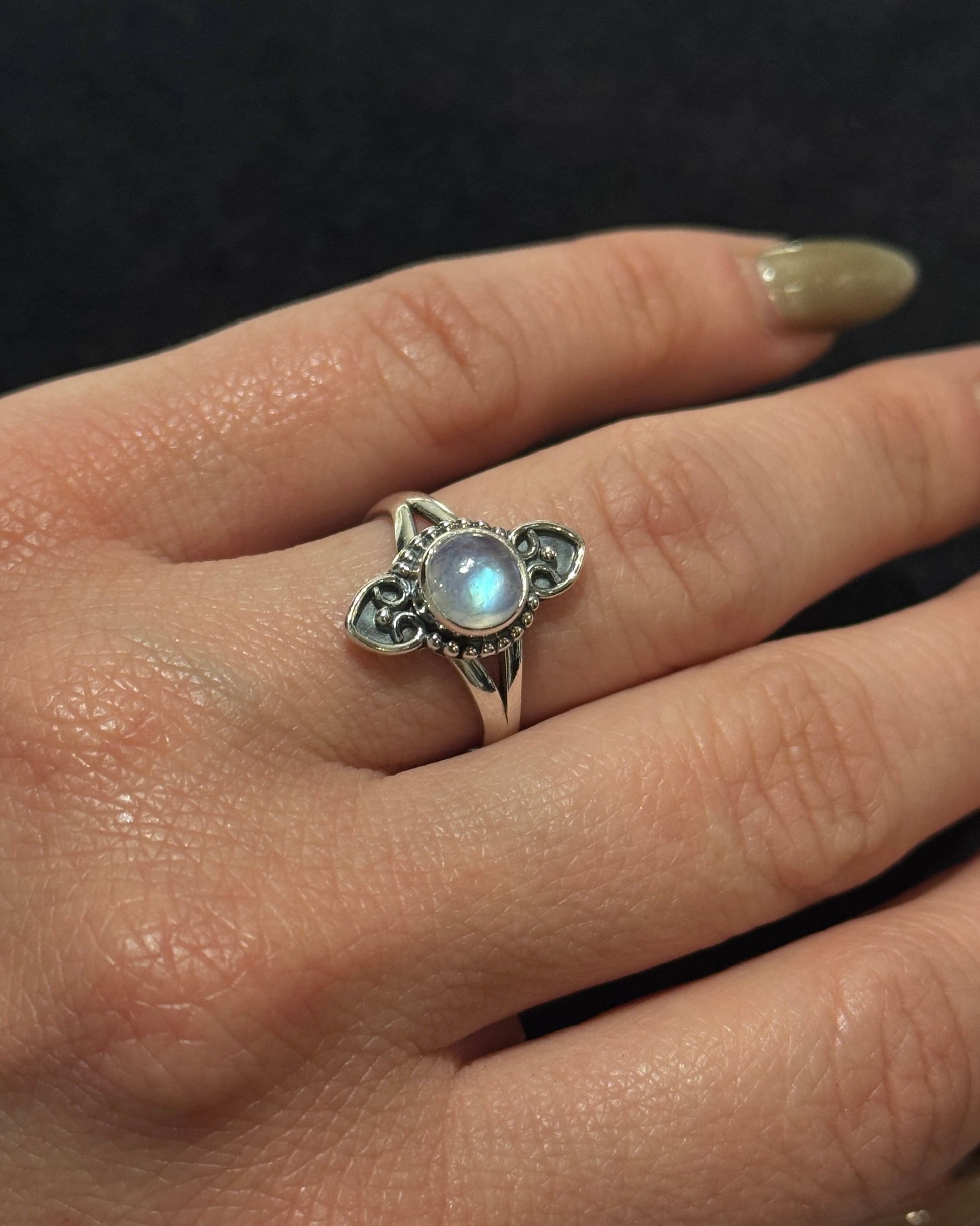 cute feminine sterling silver ring with natural moonstone in the center