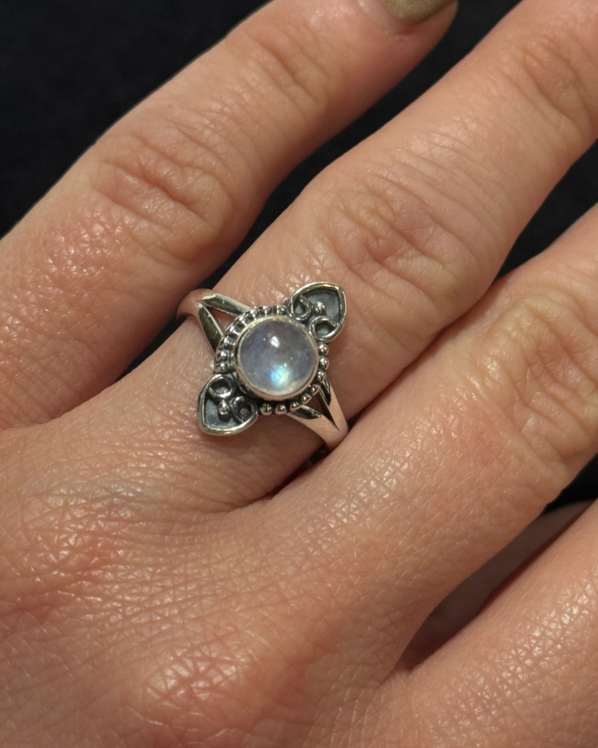 feminine sterling silver ring with natural moonstone in the center