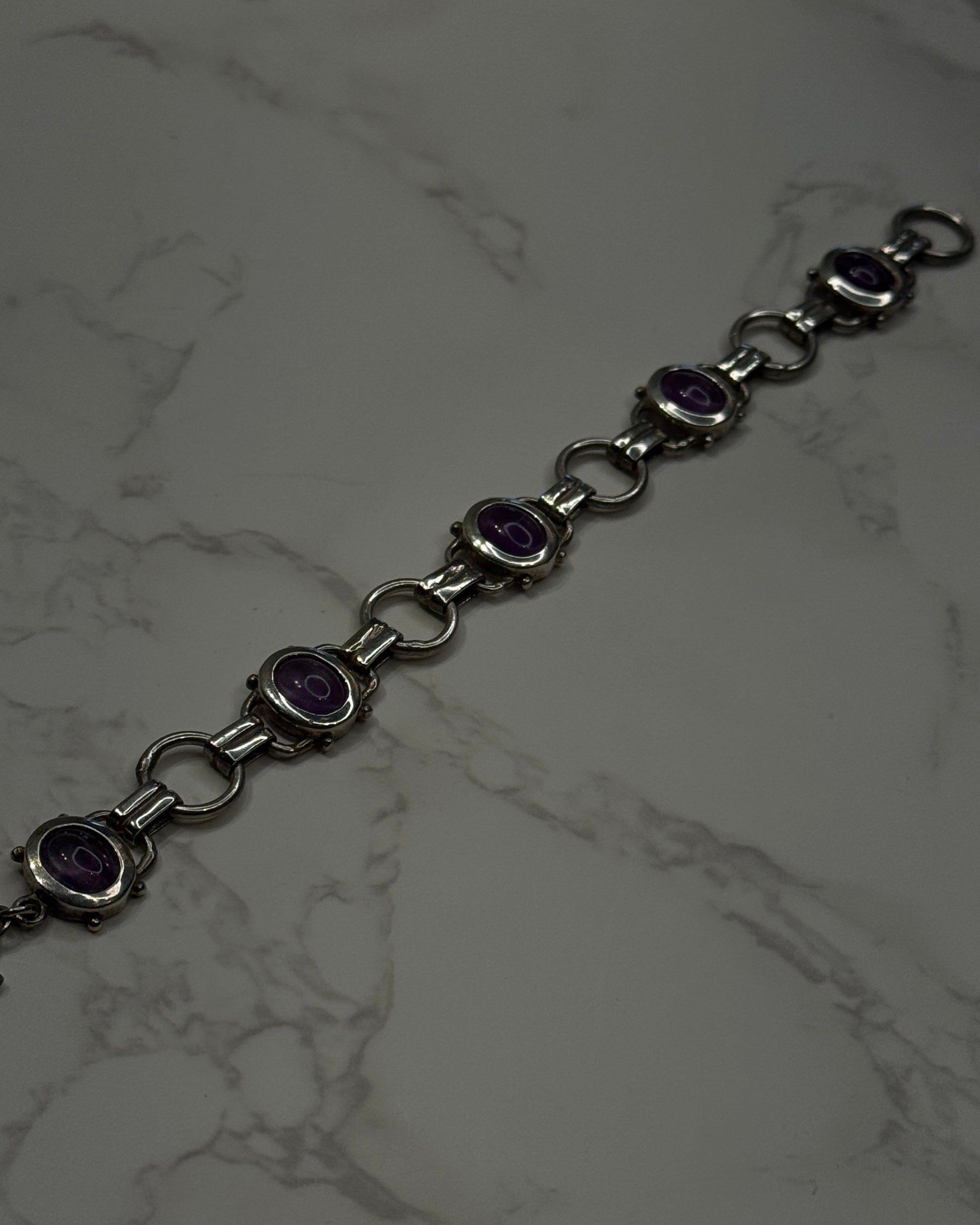 sterling silver bracelet with natural amethyst oval shaped
