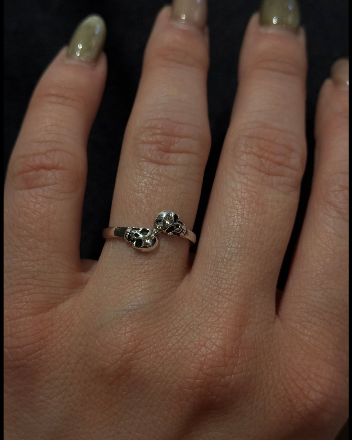 a couple of skulls sterling silver ring