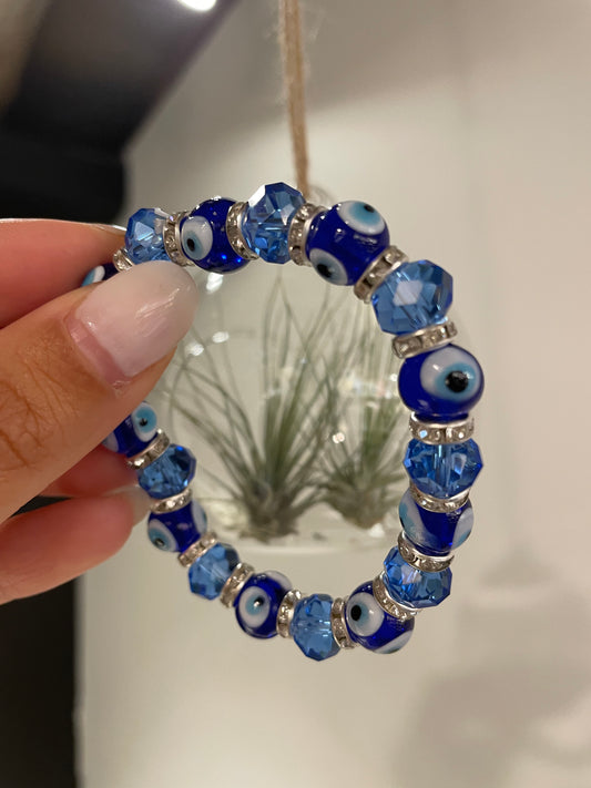 Evil eye with blue faceted glass beads bracelet