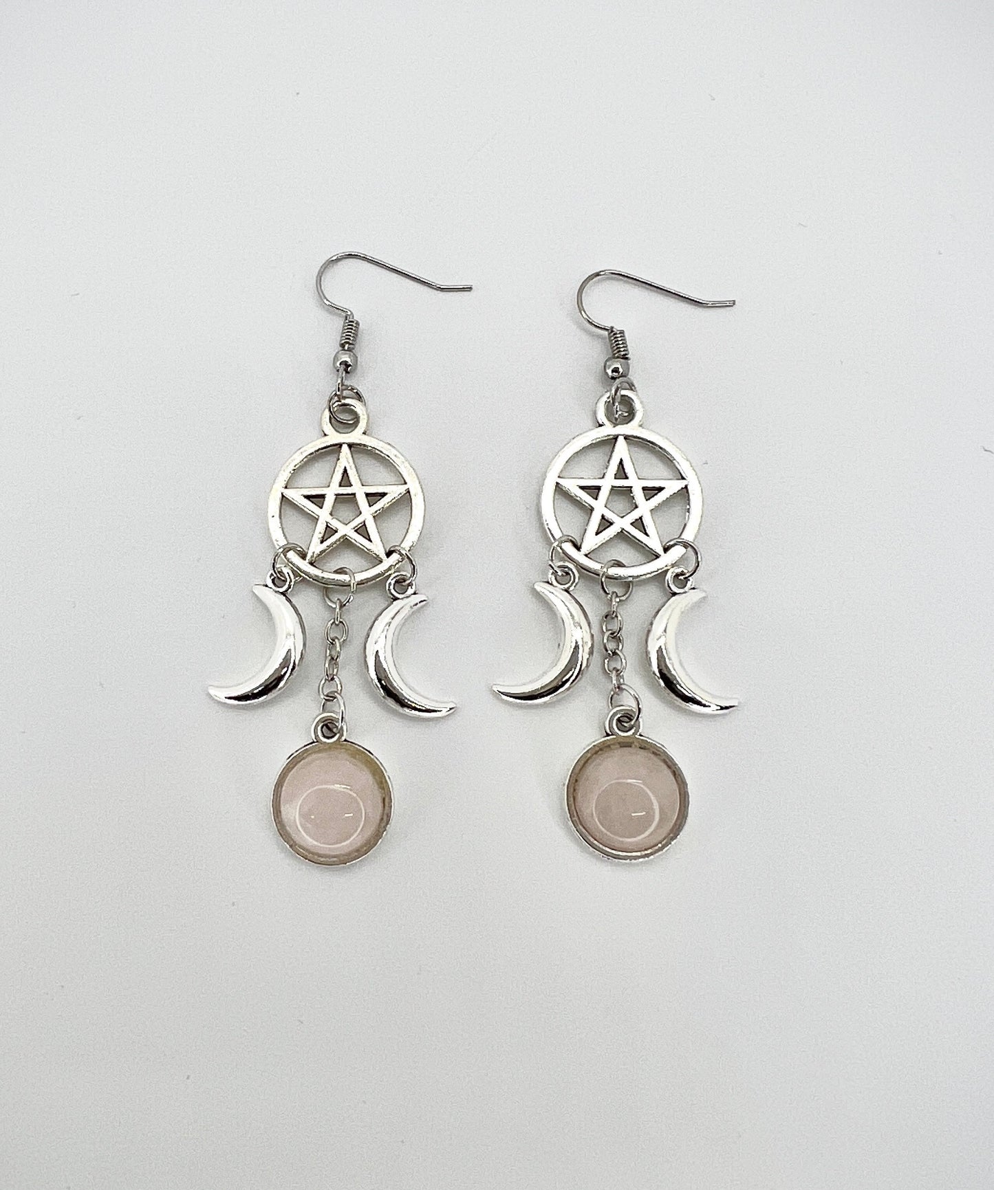 tripple goddess earrings with pentagram symbol and rose quartz
